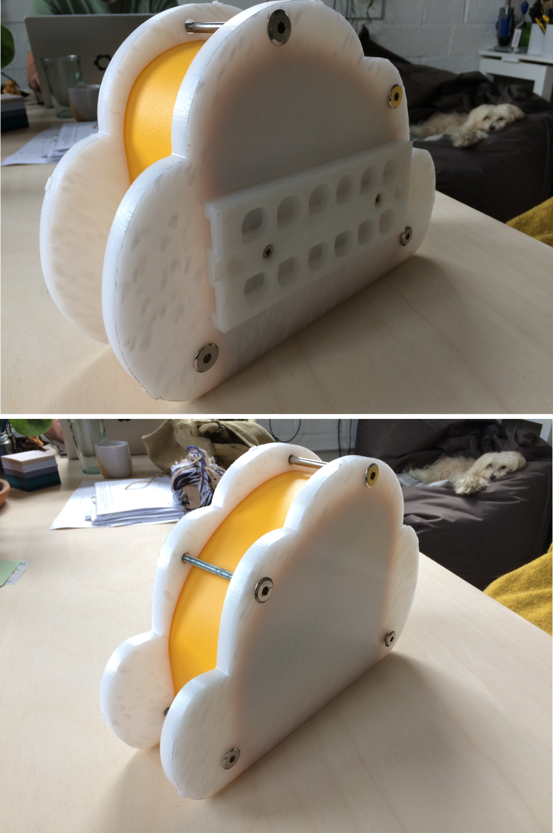 Photo of plastic housing showing mounting bracket attached