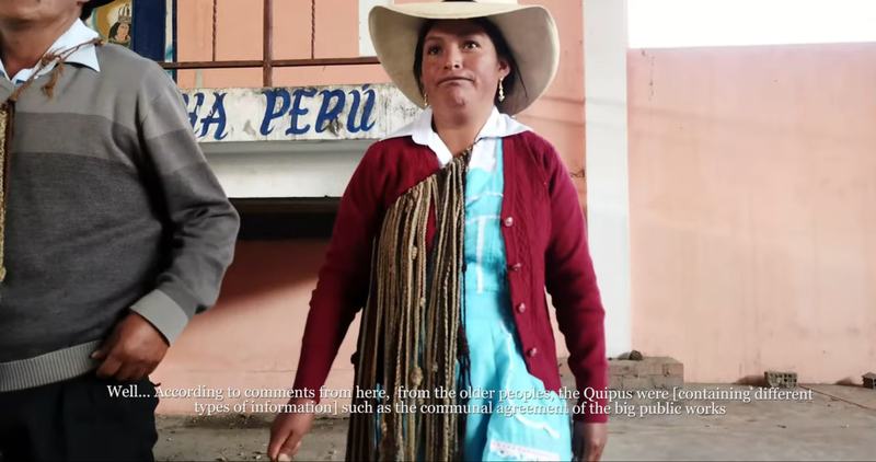 An elected representative wearing their khipu as a symbol of the trust of their community